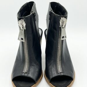 Sleek Black Zipper Heeled Boots